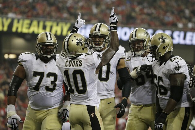 New Orleans Saints wide receiver Brandin Cooks (10) celebrates his touchdown against the Atlanta Falcons during the first half of an NFL football game, Sunday, Sept. 7, 2014, in Atlanta. (AP Photo/David Goldman)