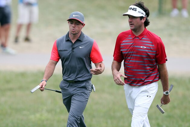 Aug 7, 2014; Louisville, KY, USA; PGA golfers from left to right Martin Kaymer, Rory McIlroy, and Bubba Watson walk up the14th fairway during the first round of the 2014 PGA Championship golf tournament at Valhalla Golf Club. Mandatory Credit: Brian Spurlock-USA TODAY Sports
