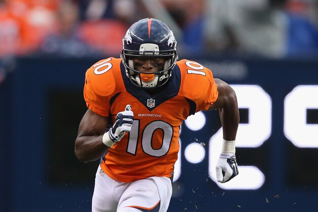 DENVER, CO - AUGUST 07:  Wide receiver Emmanuel Sanders #10 of the Denver Broncos leaves the line of scrimmage against the Seattle Seahawks during preseason action at Sports Authority Field at Mile High on August 7, 2014 in Denver, Colorado. The Broncos defeated the Seahawks 21-16.  (Photo by Doug Pensinger/Getty Images)