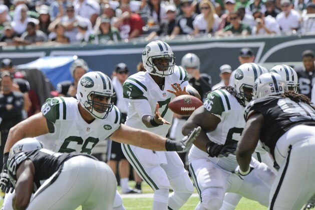 New York Jets quarterback Geno Smith (7) takes the snap during the first half of an NFL football game against the Oakland Raiders Sunday, Sept. 7, 2014, in East Rutherford, N.J. (AP Photo/Bill Kostroun) New York Jets quarterback Geno Smith (7) takes the snap during the first half of an NFL football game against the Oakland Raiders Sunday, Sept. 7, 2014, in East Rutherford, N.J. (AP Photo/Bill Kostroun)