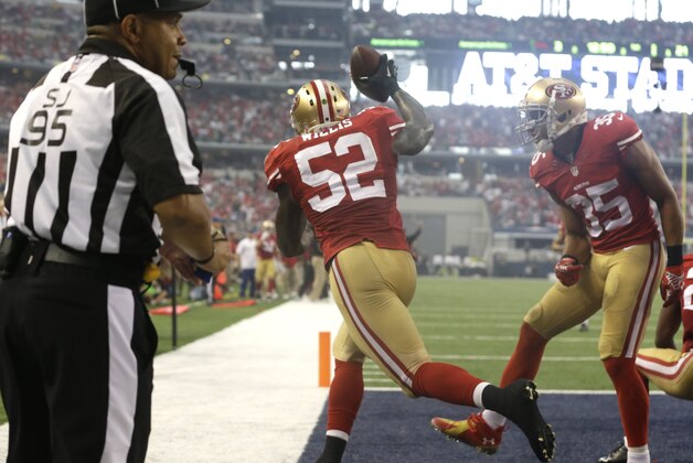 San Francisco 49ers inside linebacker Patrick Willis (52) celebrates with teammate free safety Eric Reid (35) after intercepting a pass intended for Dallas Cowboys tight end Jason Witten (82) in the end zone during first half of an NFL football game, Sunday, Sept. 7, 2014, in Arlington, Texas. (AP Photo/LM Otero)
