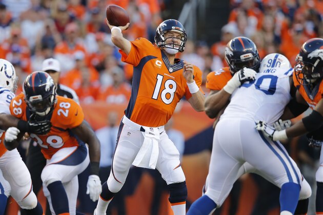 Denver Broncos quarterback Peyton Manning (18) looks to pass against the Indianapolis Colts during the first half of an NFL football game, Sunday, Sept. 7, 2014, in Denver. (AP Photo/Jack Dempsey) Denver Broncos quarterback Peyton Manning (18) looks to pass against the Indianapolis Colts during the first half of an NFL football game, Sunday, Sept. 7, 2014, in Denver. (AP Photo/Jack Dempsey)