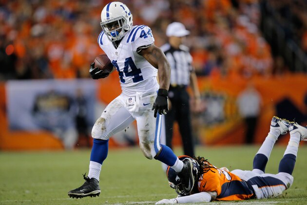 DENVER, CO - SEPTEMBER 07:  Running back Ahmad Bradshaw #44 of the Indianapolis Colts makes a reception and breaks a tackle by cornerback Bradley Roby #29 of the Denver Broncos at Sports Authority Field at Mile High on September 7, 2014 in Denver, Colorado.  (Photo by Doug Pensinger/Getty Images)