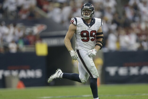 Houston Texans defensive end J.J. Watt (99) runs off the field during the third quarter of an NFL football game Sunday, Sept. 7, 2014, in Houston. (AP Photo/Patric Schneider)