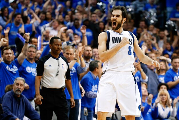 May 2, 2014; Dallas, TX, USA; Dallas Mavericks guard Jose Calderon (8) reacts after hitting a three point shot during the game against the San Antonio Spurs in game six of the first round of the 2014 NBA Playoffs at American Airlines Center. Mandatory Credit: Kevin Jairaj-USA TODAY Sports