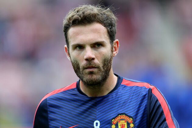 Manchester United's Juan Mata ahead of  their English Premier League soccer match against Sunderland at the Stadium of Light, Sunderland, England, Sunday, Aug. 24, 2014. (AP Photo/Scott Heppell)