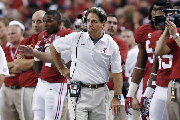 Alabama coach Nick Saban watches from the sideline in the first half of an NCAA college football game against West Virginia on Saturday, Aug. 30, 2014, in Atlanta. Alabama won 33-23. (AP Photo/John Bazemore)