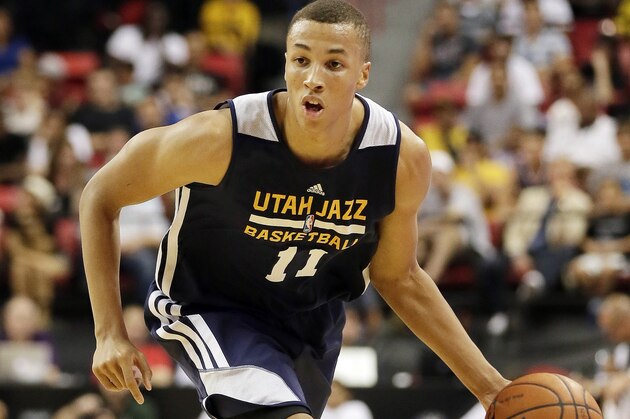 Utah Jazz's Dante Exum drives up the court against the Milwaukee Bucks during the first half of an NBA summer league basketball game Monday, July 14, 2014, in Las Vegas. (AP Photo/John Locher)