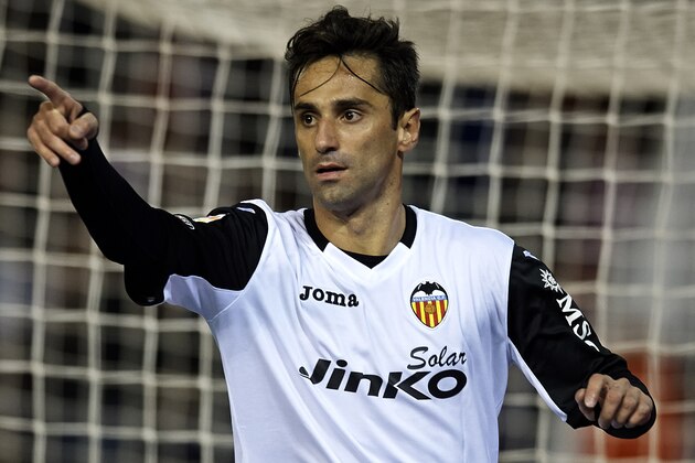 VALENCIA, SPAIN - DECEMBER 01:  Jonas of Valencia celebrates after scoring during the La Liga match between Valencia CF  and CA Osasuna at Estadio Mestalla on December 01, 2013 in Valencia, Spain.  (Photo by Manuel Queimadelos Alonso/Getty Images)