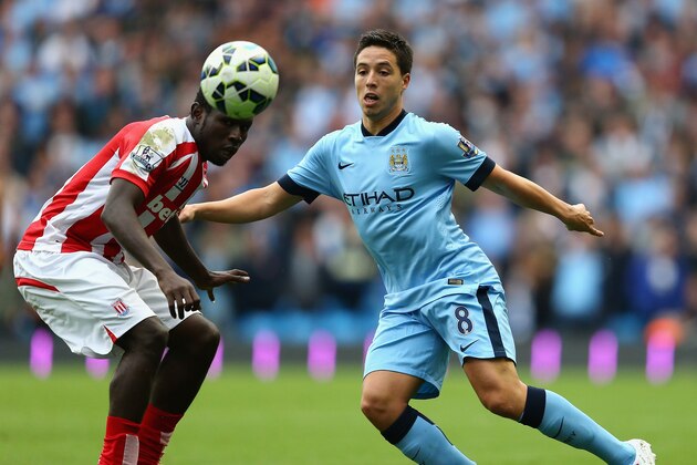 MANCHESTER, ENGLAND - AUGUST 30:  Samir Nasri of Manchester City in action during the Barclays Premier League match between Manchester United and Stoke City at Etihad Stadium on August 30, 2014 in Manchester, England.  (Photo by Clive Mason/Getty Images)