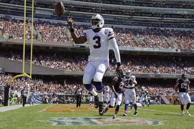 Buffalo Bills quarterback EJ Manuel (3) celebrates a touchdown during the first half of an NFL football game against the Chicago Bears  onSunday, Sept. 7, 2014, in Chicago. (AP Photo/Nam Y. Huh)