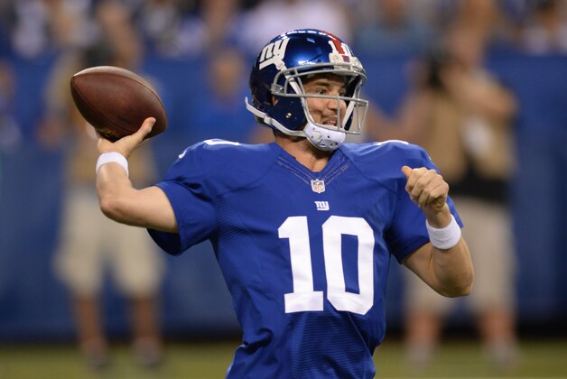 New York Giants quarterback Eli Manning (10) throws during the first half of an NFL preseason football game against the Indianapolis Colts Saturday, Aug. 16, 2014, in Indianapolis. (AP Photo/Chris Howell)