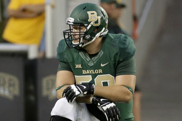 Baylor offensive tackle Spencer Drango (58) kneels on the line of scrimmage between plays in an NCAA college football game against Northwestern State, Saturday, Sept. 6, 2014, in Waco, Texas. (AP Photo/Tony Gutierrez) Baylor offensive tackle Spencer Drango (58) kneels on the line of scrimmage between plays in an NCAA college football game against Northwestern State, Saturday, Sept. 6, 2014, in Waco, Texas. (AP Photo/Tony Gutierrez)