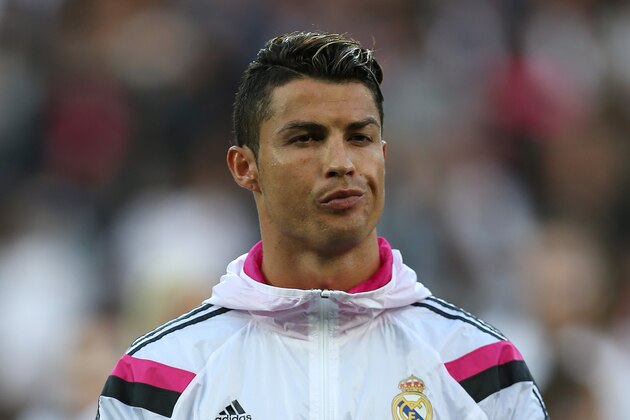 CARDIFF, WALES - AUGUST 12:  Cristiano Ronaldo of Real Madrid looks on during the UEFA Super Cup match between  Real Madrid and Sevilla at Cardiff City Stadium on August 12, 2014 Cardiff, Wales. (Photo by Ian MacNicol/Getty Images)