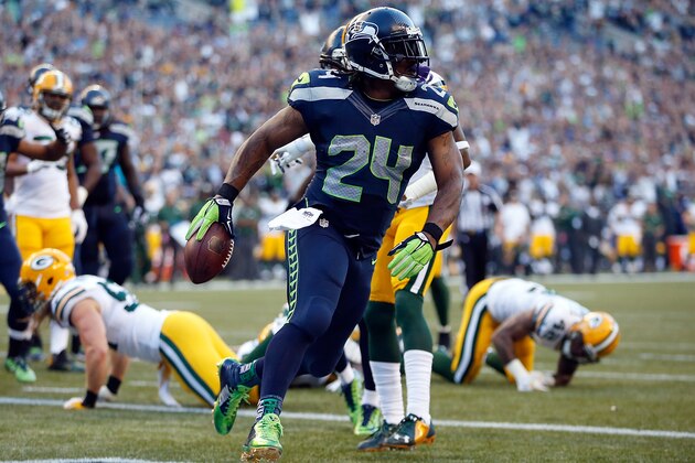 SEATTLE, WA - SEPTEMBER 04: Running back Marshawn Lynch #24 of the Seattle Seahawks scores a touchdown during the second quarter of the game against the Green Bay Packers at CenturyLink Field on September 4, 2014 in Seattle, Washington.  (Photo by Otto Greule Jr/Getty Images)
