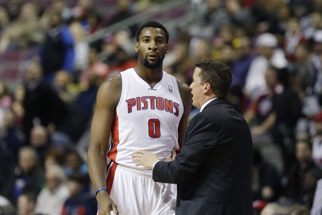 Detroit Pistons center Andre Drummond (0) talks with interim head coach John Loyer during the first half of an NBA basketball game against the Golden State Warriors in Auburn Hills, Mich., Monday, Feb. 24, 2014. (AP Photo/Carlos Osorio)
