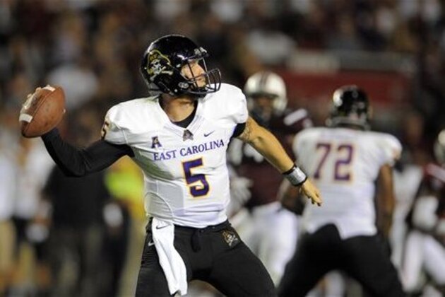 East Carolina quarterback Shane Carden (5) throws downfield during the first half of an NCAA college football game against South Carolina, Saturday, Sept. 6, 2014, in Columbia, S.C. (AP Photo/Stephen B. Morton)