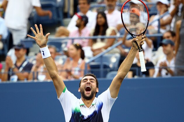NEW YORK, NY - SEPTEMBER 06:  Marin Cilic of Croatia celebrates after defeating Roger Federer of Switzerland during their men's singles semifinal match on Day Thirteen of the 2014 US Open at the USTA Billie Jean King National Tennis Center on September 6, 2014 in the Flushing neighborhood of the Queens borough of New York City.  Cilic defeated Federer in three sets 6-3, 6-4, 6-4.  (Photo by Streeter Lecka/Getty Images)