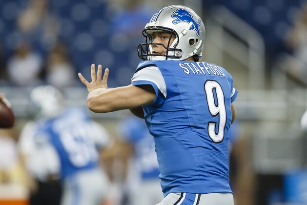 Detroit Lions quarterback Matthew Stafford (9) warms up before a preseason NFL football game against the Jacksonville Jaguars at Ford Field in Detroit, Friday, Aug. 22, 2014. (AP Photo/Rick Osentoski)
