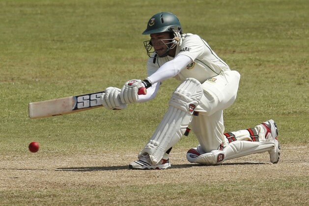 Bangladesh captain Mushfiqur Rahim bats during the third day of the first test cricket match between Sri Lanka and Bangladesh in Galle, Sri Lanka, Sunday, March 10, 2013. (AP Photo/Eranga Jayawardena)