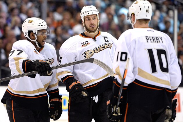 LOS ANGELES, CA - MAY 14:  Devante Smith-Pelly #77 Ryan Getzlaf #15 and Corey Perry #10 of the Anaheim Ducks discuss positions during the third period against the Los Angeles Kings in Game Six of the Second Round of the 2014 NHL Stanley Cup Playoffs at Staples Center on May 14, 2014 in Los Angeles, California.  (Photo by Harry How/Getty Images)