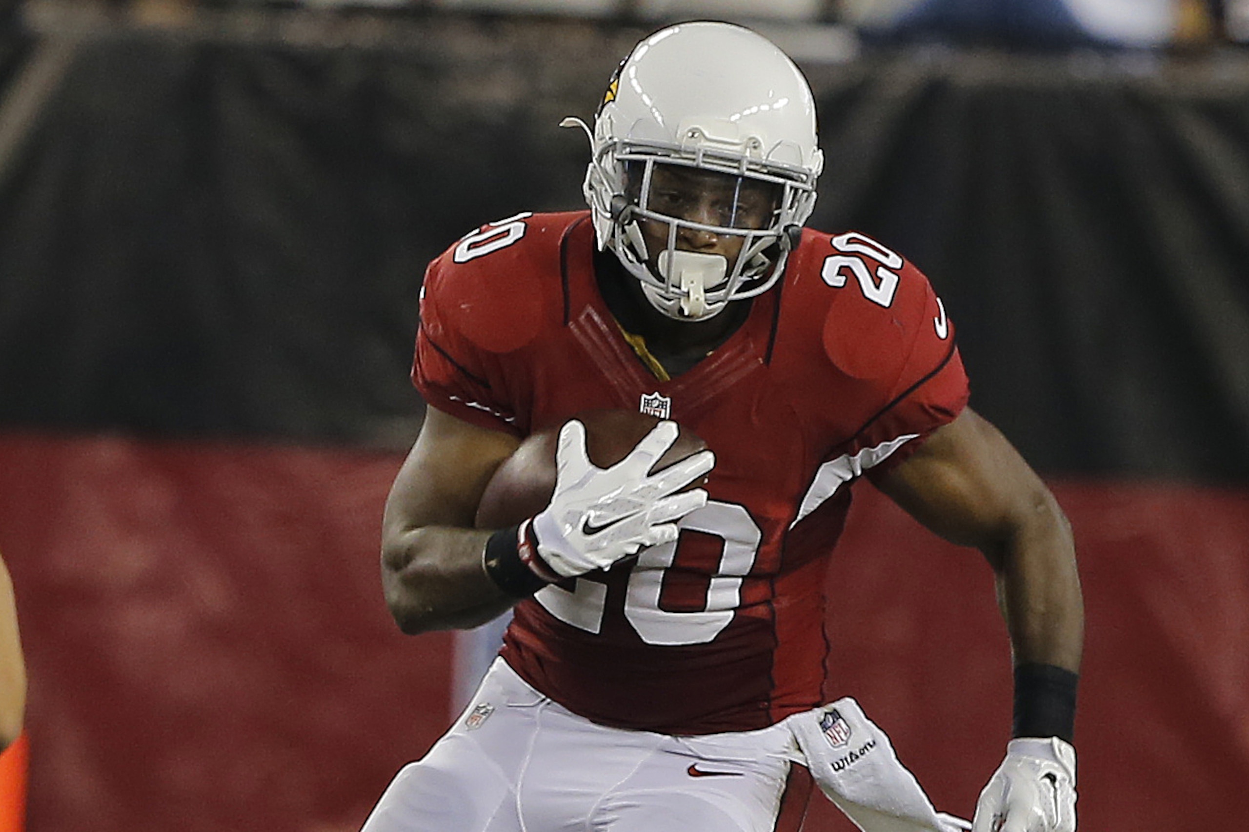 Arizona Cardinals running back Jonathan Dwyer (20) during the first quarter of an NFL football game, Saturday, Aug. 9, 2014 in Glendale, Ariz. (AP Photo/Rick Scuteri)
