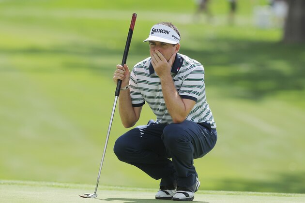 CHERRY HILLS VILLAGE, CO - SEPTEMBER 04:  Keegan Bradley of the United States lines up a putt on the fifth green during the first round of the BMW Championship at the Cherry Hills Country Club on September 4, 2014 in Cherry Hills Village, Colorado.  (Photo by Scott Halleran/Getty Images)