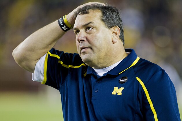 1Michigan head coach Brady Hoke looks up at the scoreboard in the fourth quarter of an NCAA college football game with Nebraska in Ann Arbor, Mich., Saturday, Nov. 9, 2013. Nebraska won 17-13. (AP Photo/Tony Ding)