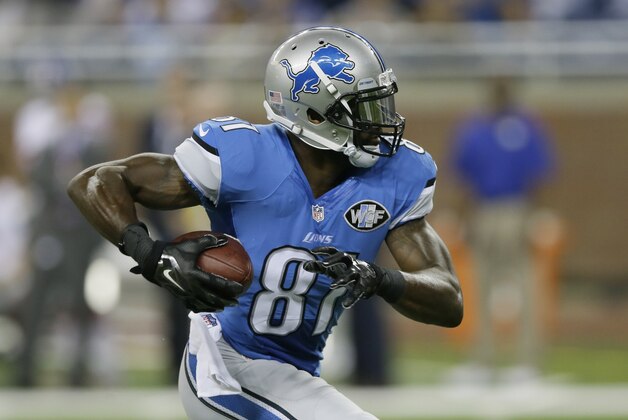 Detroit Lions wide receiver Calvin Johnson runs for a 67-yard touchdown reception during the first quarter of an NFL football game against the New York Giants in Detroit, Monday, Sept. 8, 2014. (AP Photo/Carlos Osorio)
