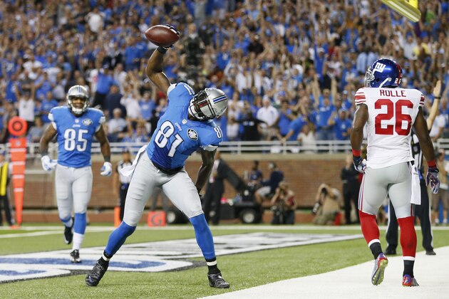 Detroit Lions wide receiver Calvin Johnson throws down the football after scoring on a 16-yard reception during the first quarter of an NFL football game against the New York Giants in Detroit, Monday, Sept. 8, 2014. (AP Photo/Rick Osentoski) Detroit Lions wide receiver Calvin Johnson throws down the football after scoring on a 16-yard reception during the first quarter of an NFL football game against the New York Giants in Detroit, Monday, Sept. 8, 2014. (AP Photo/Rick Osentoski)