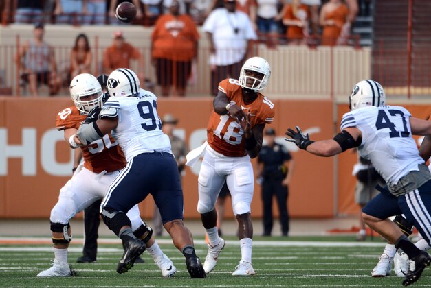Sep 6, 2014; Austin, TX, USA; Texas Longhorns quarterback Tyrone Swoopes (18) passes the ball against the Brigham Young Cougars during the first half at Darrell K Royal-Texas Memorial Stadium. Mandatory Credit: Brendan Maloney-USA TODAY Sports