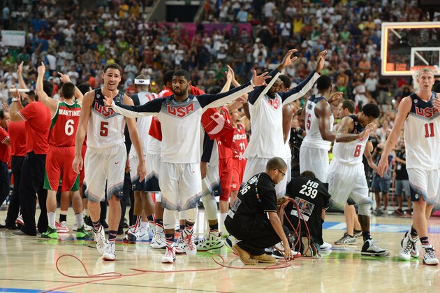 BARCELONA, SPAIN - SEPTEMBER 6: Members of the USA Basketball Men's National Team waves to the crowd after the game against the Mexico National Team during the 2014 FIBA World Cup at Palau Sant Jordi on September 6, 2014 in Barcelona, Spain.  NOTE TO USER: User expressly acknowledges and agrees that, by downloading and/or using this Photograph, user is consenting to the terms and conditions of the Getty Images License Agreement. Mandatory Copyright Notice: Copyright 2014 NBAE (Photo by Garrett Ellwood/NBAE via Getty Images)