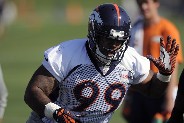 Denver Broncos defensive tackle Kevin Vickerson practices at an NFL training camp in Englewood, Colo., on Saturday, Aug. 9, 2014. (AP Photo/Chris Schneider)