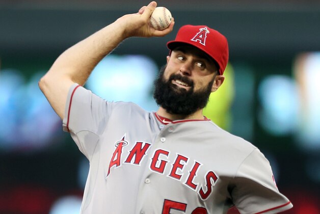 Los Angeles Angels pitcher Matt Shoemaker throws against the Minnesota Twins in the first inning of a baseball game, Friday, Sept. 5, 2014, in Minneapolis. (AP Photo/Jim Mone)