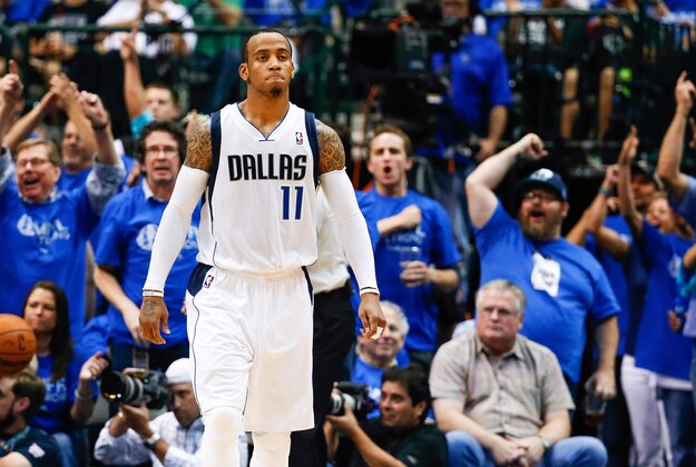Apr 26, 2014; Dallas, TX, USA; Dallas Mavericks guard Monta Ellis (11) reacts during the game against the San Antonio Spurs in game three of the first round of the 2014 NBA Playoffs at American Airlines Center. Dallas won 109-108. Mandatory Credit: Kevin Jairaj-USA TODAY Sports