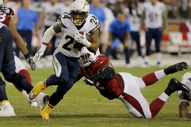 San Diego Chargers running back Ryan Mathews (24) eludes the tackle of Arizona Cardinals free safety Tony Jefferson (22) to score a touchdown during the second half of an NFL football game, Monday, Sept. 8, 2014, in Glendale, Ariz. (AP Photo/Rick Scuteri)