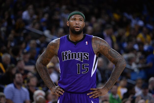 April 4, 2014; Oakland, CA, USA; Sacramento Kings center DeMarcus Cousins (15) looks on against the Golden State Warriors during the third quarter at Oracle Arena. The Warriors defeated the Kings 102-69. Mandatory Credit: Kyle Terada-USA TODAY Sports
