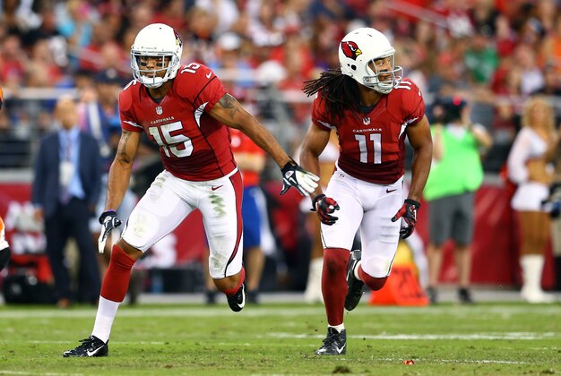 Aug 24, 2014; Glendale, AZ, USA; Arizona Cardinals wide receiver Larry Fitzgerald (11) and wide receiver Michael Floyd (15) against the Cincinnati Bengals at University of Phoenix Stadium. Mandatory Credit: Mark J. Rebilas-USA TODAY Sports Aug 24, 2014; Glendale, AZ, USA; Arizona Cardinals wide receiver Larry Fitzgerald (11) and wide receiver Michael Floyd (15) against the Cincinnati Bengals at University of Phoenix Stadium. Mandatory Credit: Mark J. Rebilas-USA TODAY Sports