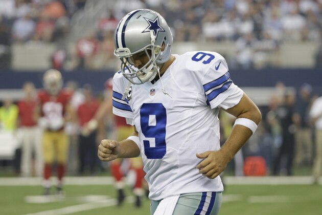 Dallas Cowboys quarterback Tony Romo (9) heads toward the sidelines after a turnover to the San Francisco 49ers in the first half of an NFL football game, Sunday, Sept. 7, 2014, in Arlington, Texas. (AP Photo/Tony Gutierrez)