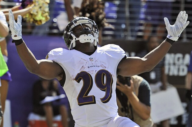 Baltimore Ravens running back Justin Forsett (29) reacts to his touchdown during the second half of an NFL football game against the Cincinnati Bengals in Baltimore, Md., Sunday, Sept. 7, 2014. (AP Photo/Nick Wass)