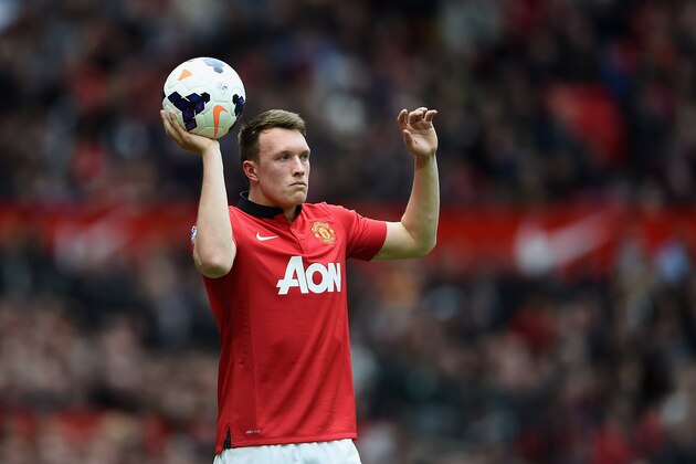 MANCHESTER, ENGLAND - APRIL 26:  Phil Jones of Machester United in action during the Barclays Premier League match between Manchester United and Norwich City at Old Trafford on April 26, 2014 in Manchester, England.  (Photo by Laurence Griffiths/Getty Images)
