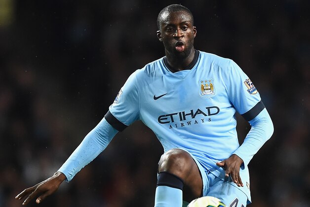 MANCHESTER, ENGLAND - AUGUST 25:  Yaya Toure of Manchester City in action during the Barclays Premier League match between Manchester City and Liverpool at the Etihad Stadium on August 25, 2014 in Manchester, England.  (Photo by Laurence Griffiths/Getty Images)