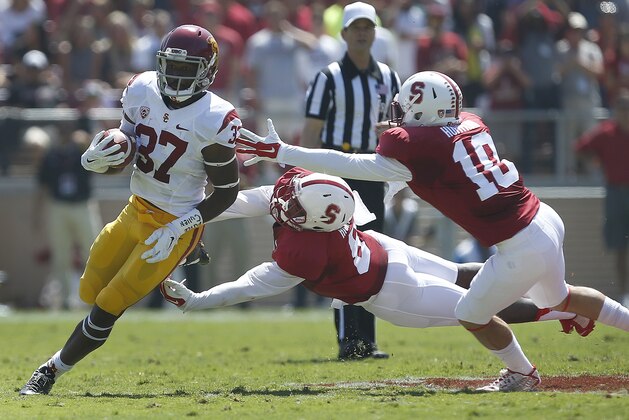 Southern California running back Javorius Allen (37) rushes against Stanford in a NCAA college football game on Saturday, Sept. 6, 2014, in Stanford, Calif. (AP Photo/Tony Avelar)