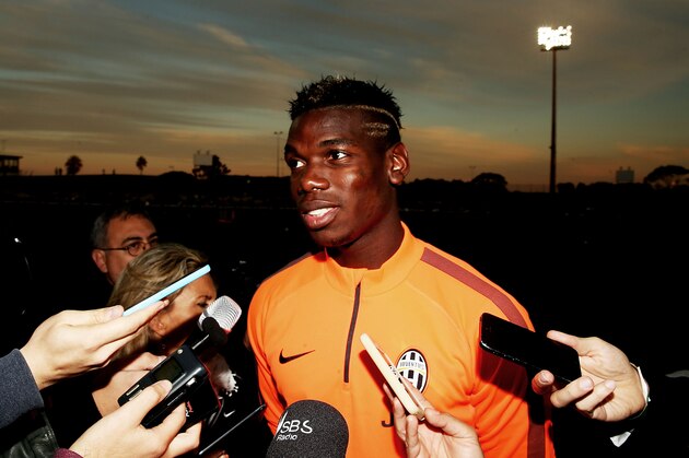 SYDNEY, AUSTRALIA - AUGUST 09:  Paul Pogba speaks to the media prior to a Juventus training session at WIN Jubilee Stadium on August 9, 2014 in Sydney, Australia.  (Photo by Mark Metcalfe/Getty Images)