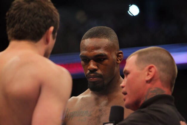 Apr 27, 2013; Newark, NJ, USA; Jon Jones (right) prior to fighting Chael Sonnen (left) during UFC 159 at the Prudential Center. Mandatory Credit: Brad Penner-USA TODAY Sports