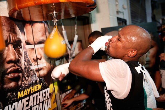 LAS VEGAS, NV - SEPTEMBER 02:  Boxer Floyd Mayweather Jr. works out at the Mayweather Boxing Club on September 2, 2014 in Las Vegas, Nevada. Mayweather Jr. will defend his WBC/WBA welterweight titles against Marcos Maidana on September 13 in Las Vegas.  (Photo by Eric Jamison/Getty Images)