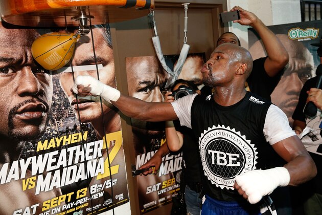 LAS VEGAS, NV - SEPTEMBER 02: Boxer Floyd Mayweather Jr. works out at the Mayweather Boxing Club on September 2, 2014 in Las Vegas, Nevada. Mayweather Jr. will defend his WBC/WBA welterweight titles against Marcos Maidana on September 13 in Las Vegas. (Photo by Eric Jamison/Getty Images) LAS VEGAS, NV - SEPTEMBER 02: Boxer Floyd Mayweather Jr. works out at the Mayweather Boxing Club on September 2, 2014 in Las Vegas, Nevada. Mayweather Jr. will defend his WBC/WBA welterweight titles against Marcos Maidana on September 13 in Las Vegas. (Photo by Eric Jamison/Getty Images)