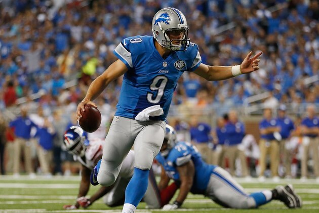 DETROIT, MI - SEPTEMBER 08: Matthew Stafford #9 of the Detroit Lions runs for a third quarter touchdown while playing the New York Giants at Ford Field on September 8, 2014 in Detroit, Michigan. (Photo by Gregory Shamus/Getty Images)