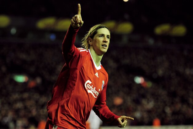 LIVERPOOL, ENGLAND - MARCH 18:  Fernando Torres of Liverpool celebrates scoring his team's second goal during the UEFA Europa League Round of 16, second leg match at Anfield on March 18, 2010 in Liverpool, England.  (Photo by Shaun Botterill/Getty Images)