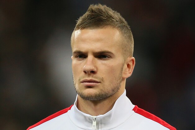 England's Tom Cleverley lines up to play against Germany in the international friendly soccer match between England and Germany, at Wembley Stadium in London, Tuesday, Nov. 19, 2013. (AP Photo/Alastair Grant)